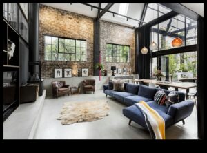 Ποιες είναι μερικές ιδέες Industrial Chic διακόσμησης σαλονιού με εκτεθειμένους τοίχους από τούβλα;